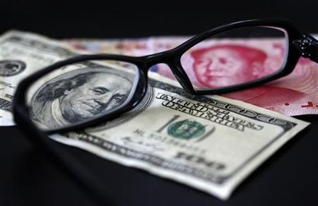 上海外為市場＝人民元が対ドルで続伸、通年では1％上昇
