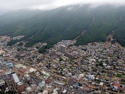 広島市長「防災計画通り対応した」 避難勧告遅れに反論