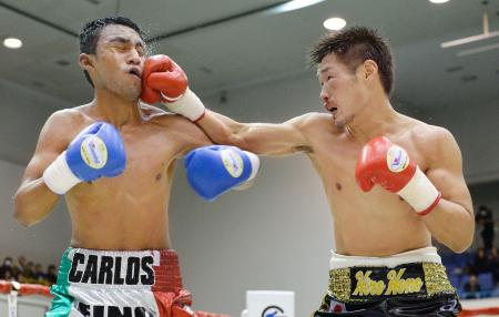 長谷川２度ダウンも辛勝 フェザー級で再度世界へ